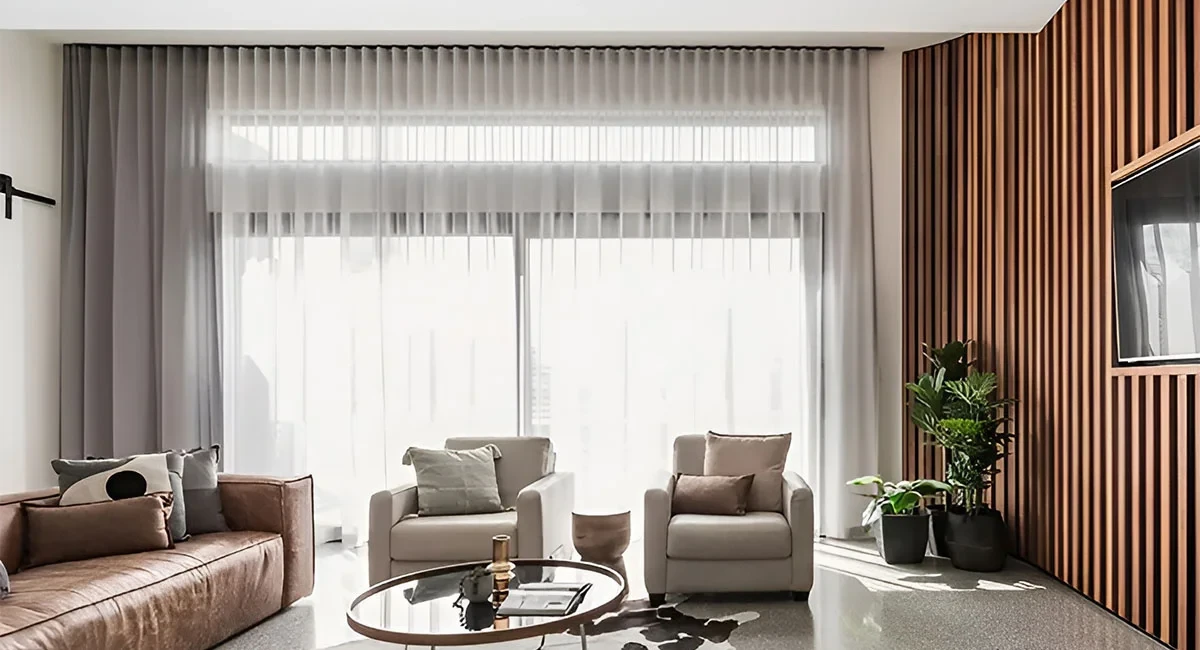 How to hang sheer curtains behind drapes.