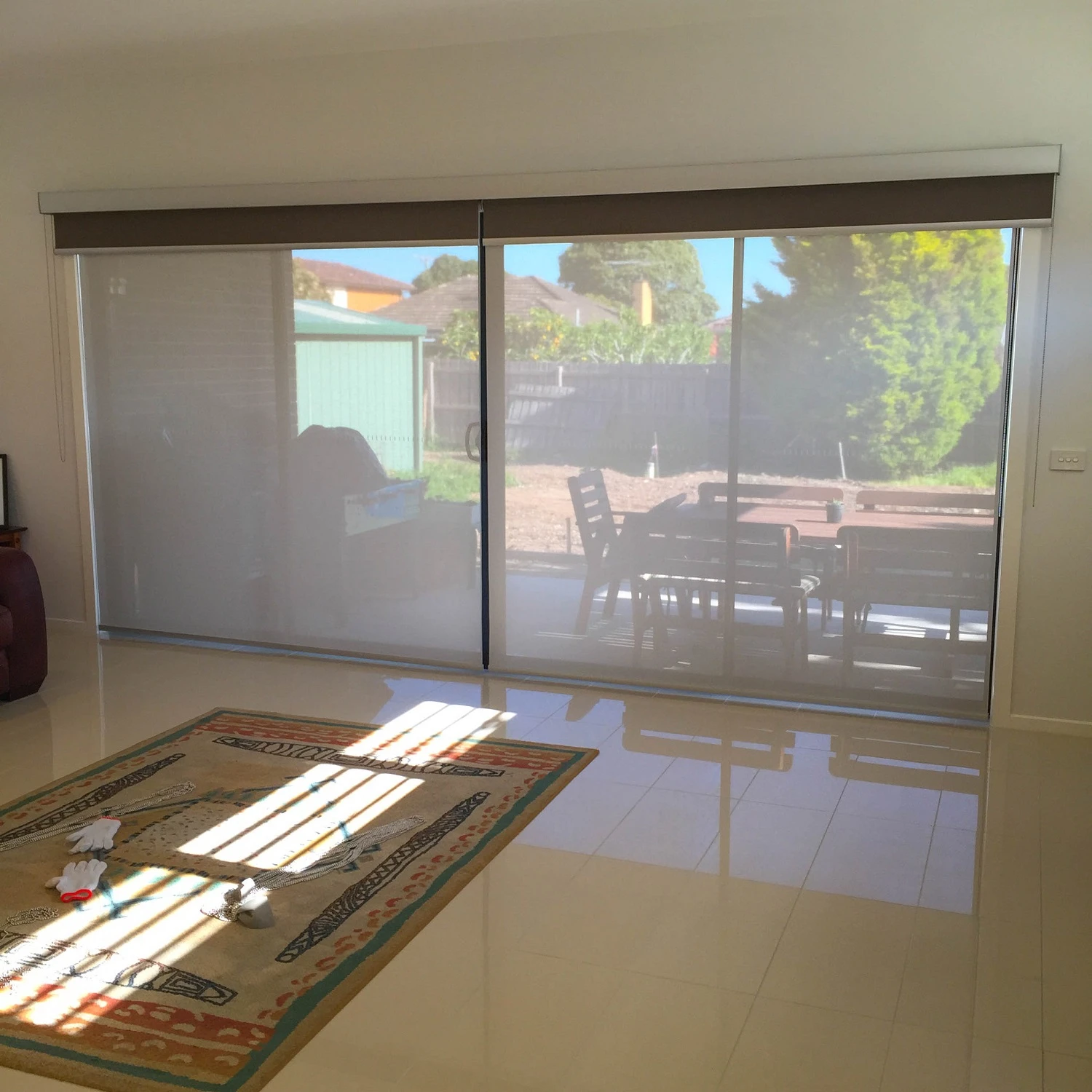 double-roller-blinds-linked-with-common-pelmet-loungeroom double-roller-blinds-linked-with-common-pelmet-loungeroom