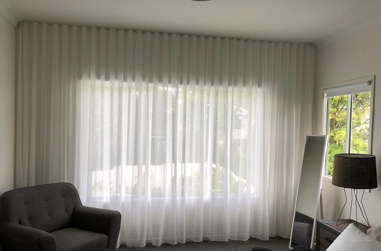 What a Difference Our New Sheer Curtains Have Made to This Space