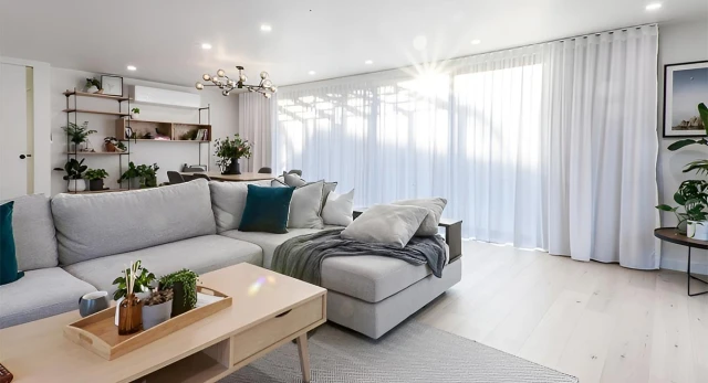 Flowing drapes or classic blinds to lift your living room