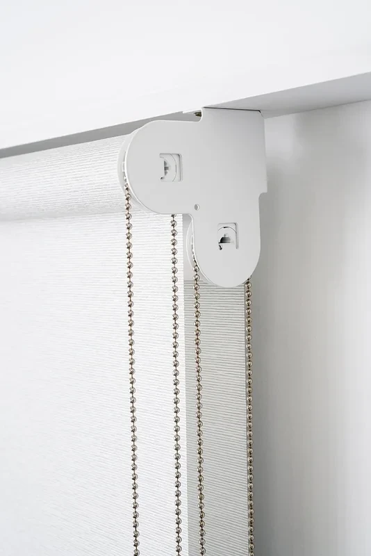 Double roller blind bracket fixed under the window head, carrying both rolls, two chain loops