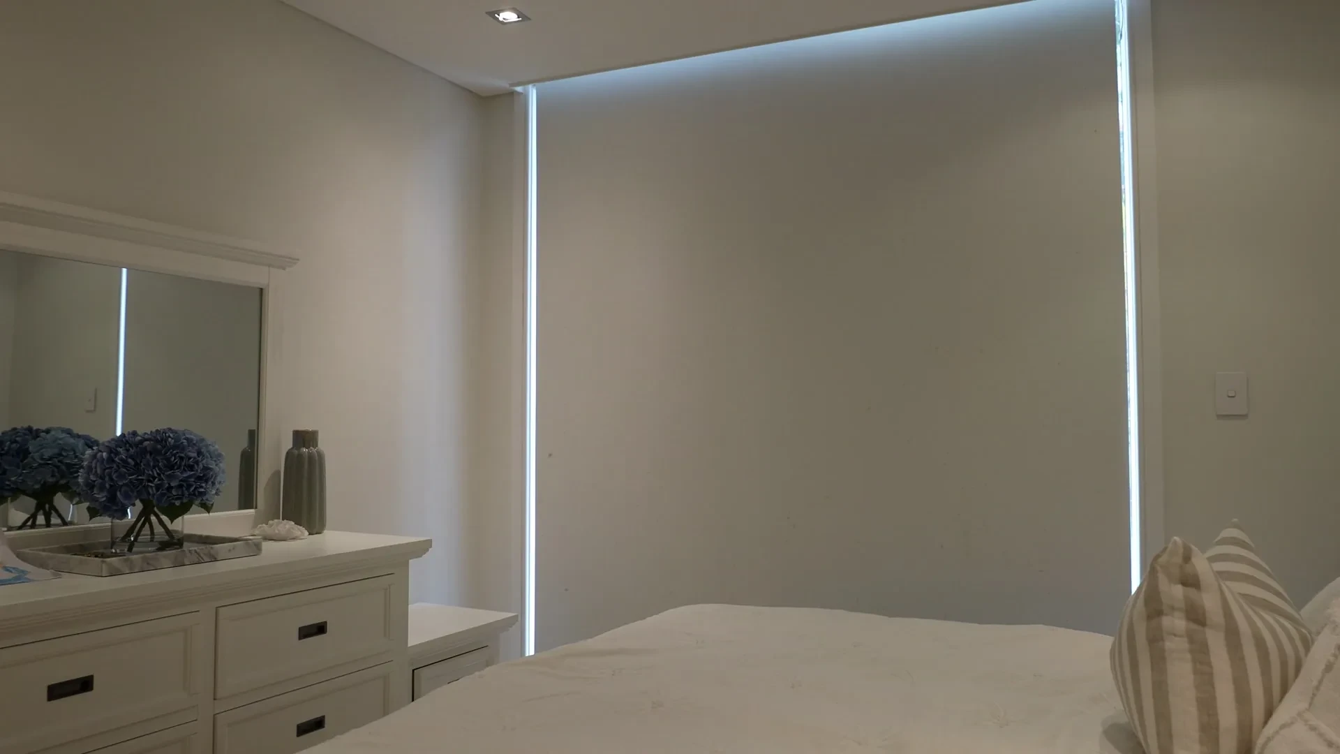 Blockout roller blind lowered in a kids bedroom at Harries' home