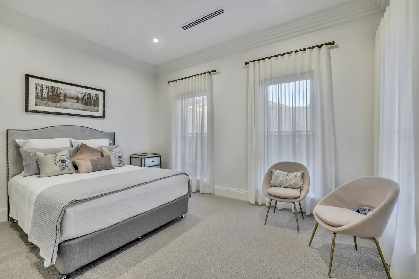 Bedroom with sheer curtains on rods Bedroom with sheer curtains on rods