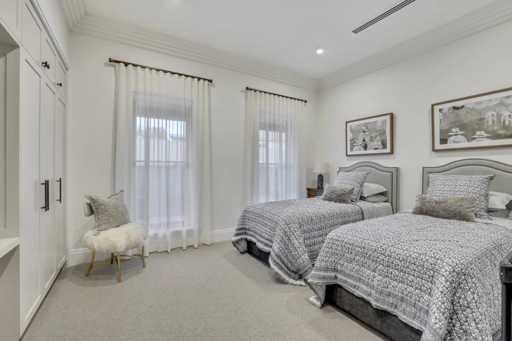 Twin bedroom with sheer curtains Twin bedroom with sheer curtains
