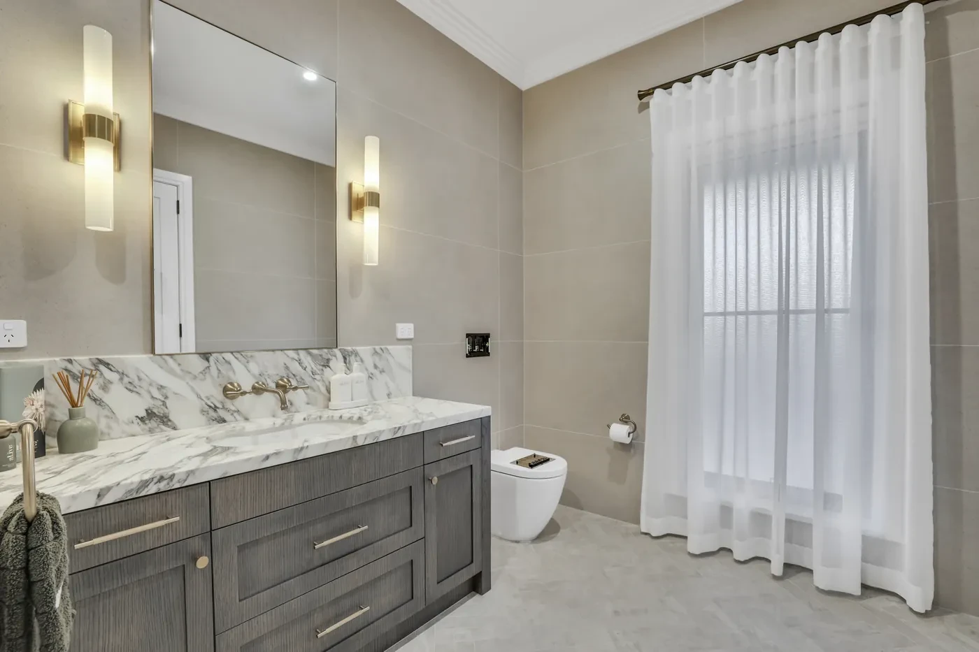 Ensuite with a sheer curtain Ensuite with a sheer curtain