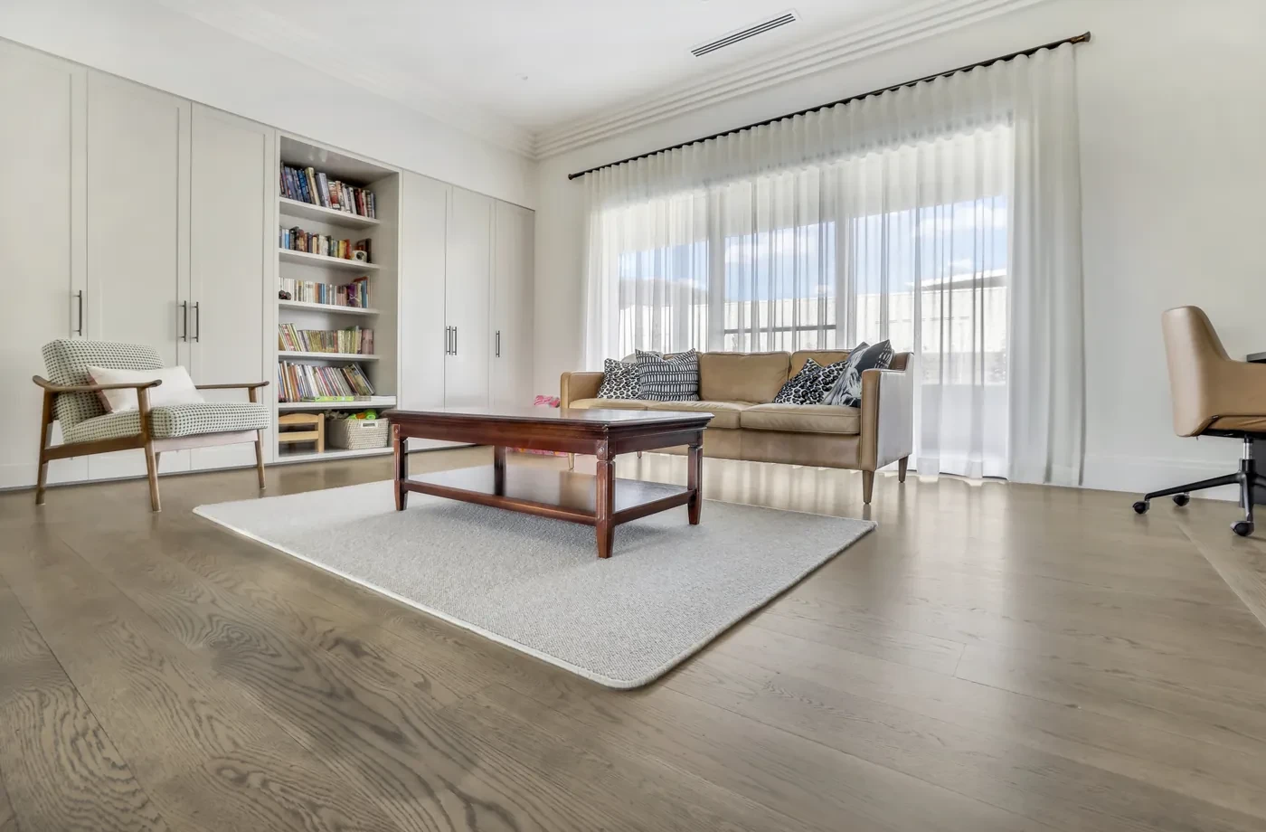 Rumpus room with sheer curtains on the doors Rumpus room with sheer curtains on the doors