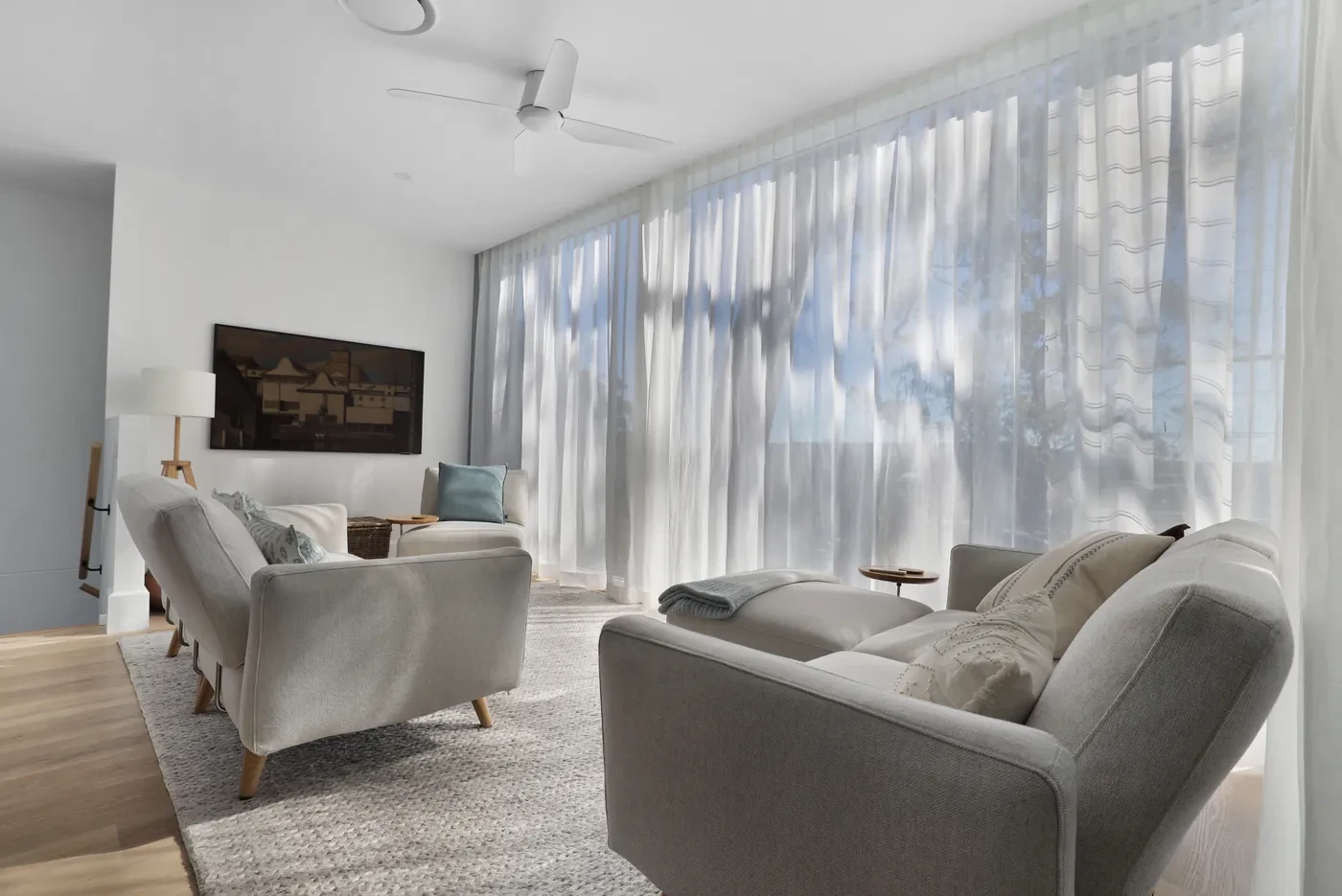 Living room with sheer curtains Living room with sheer curtains