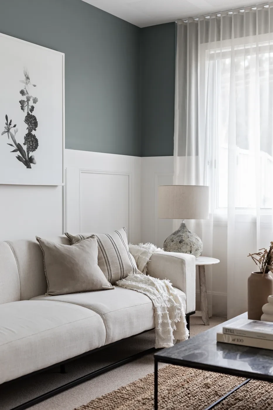 Sofa beside a sheer curtain Sofa beside a sheer curtain