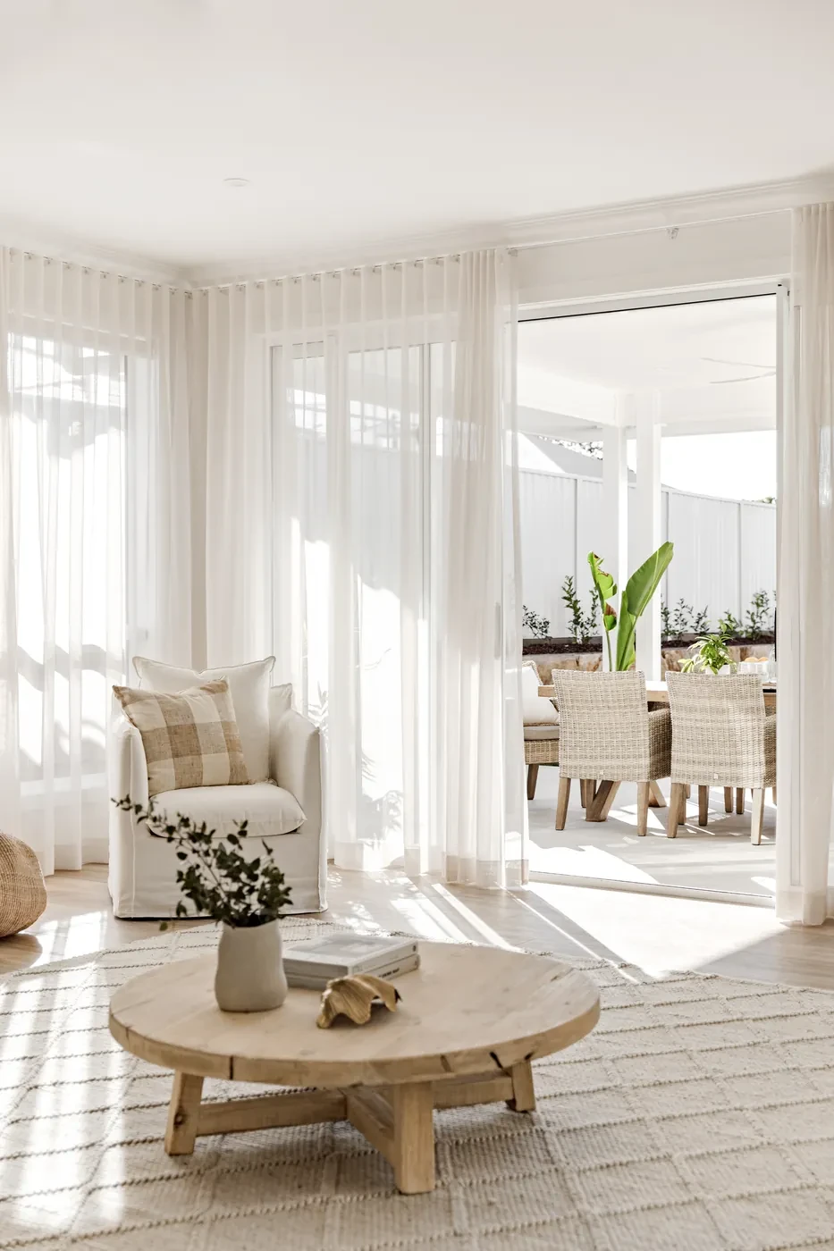 Dining area with sheer curtains Dining area with sheer curtains