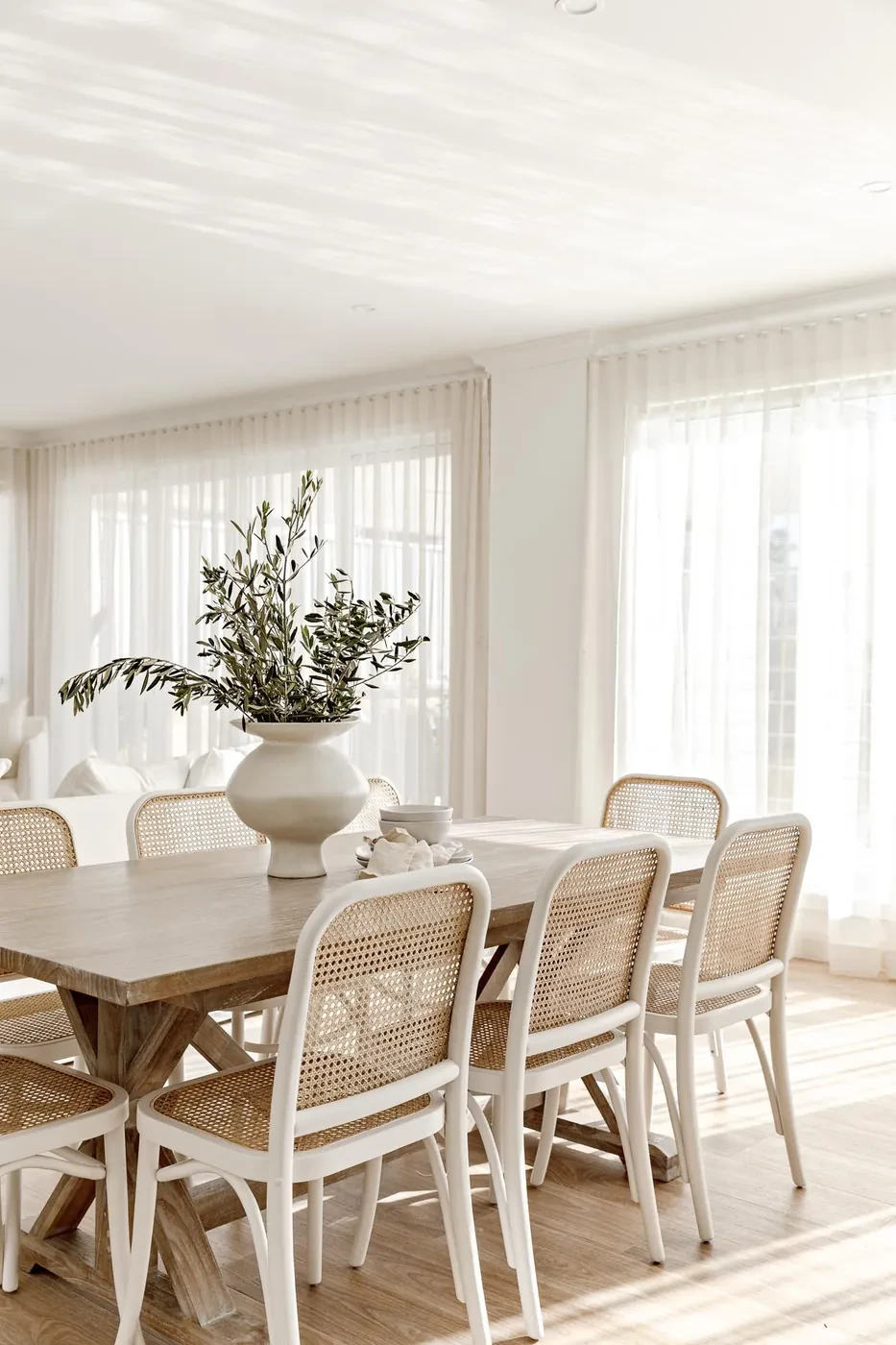 Dining room with sheer curtains Dining room with sheer curtains