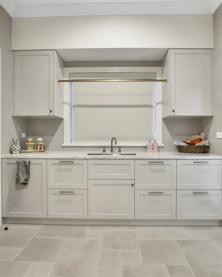 Blockout roller blind above a laundry bench