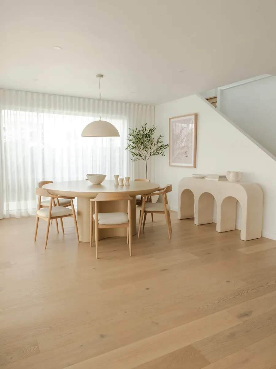 Dining room in HAAUS.7: Milk HAALUX Aire S-Fold sheers across the whole back wall, from the ceiling to the floor
