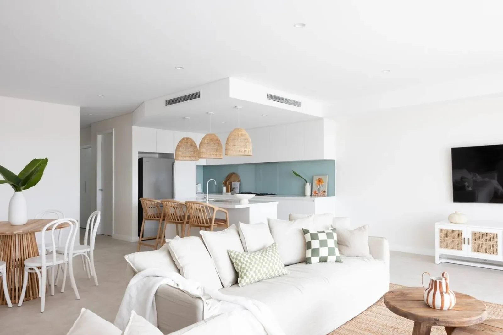 Open-plan living and kitchen at Magenta Palms