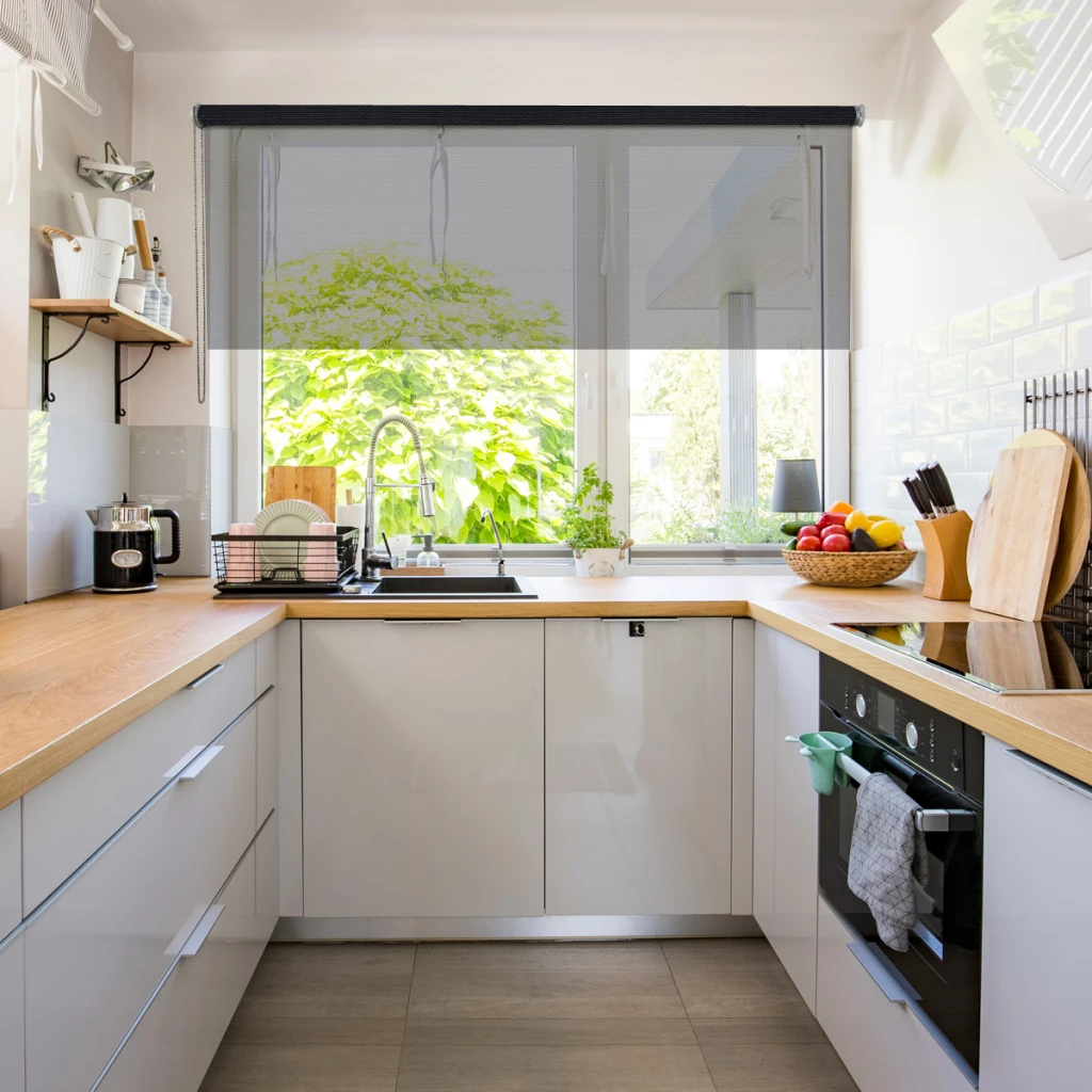 Sunscreen roller blind in the kitchen window